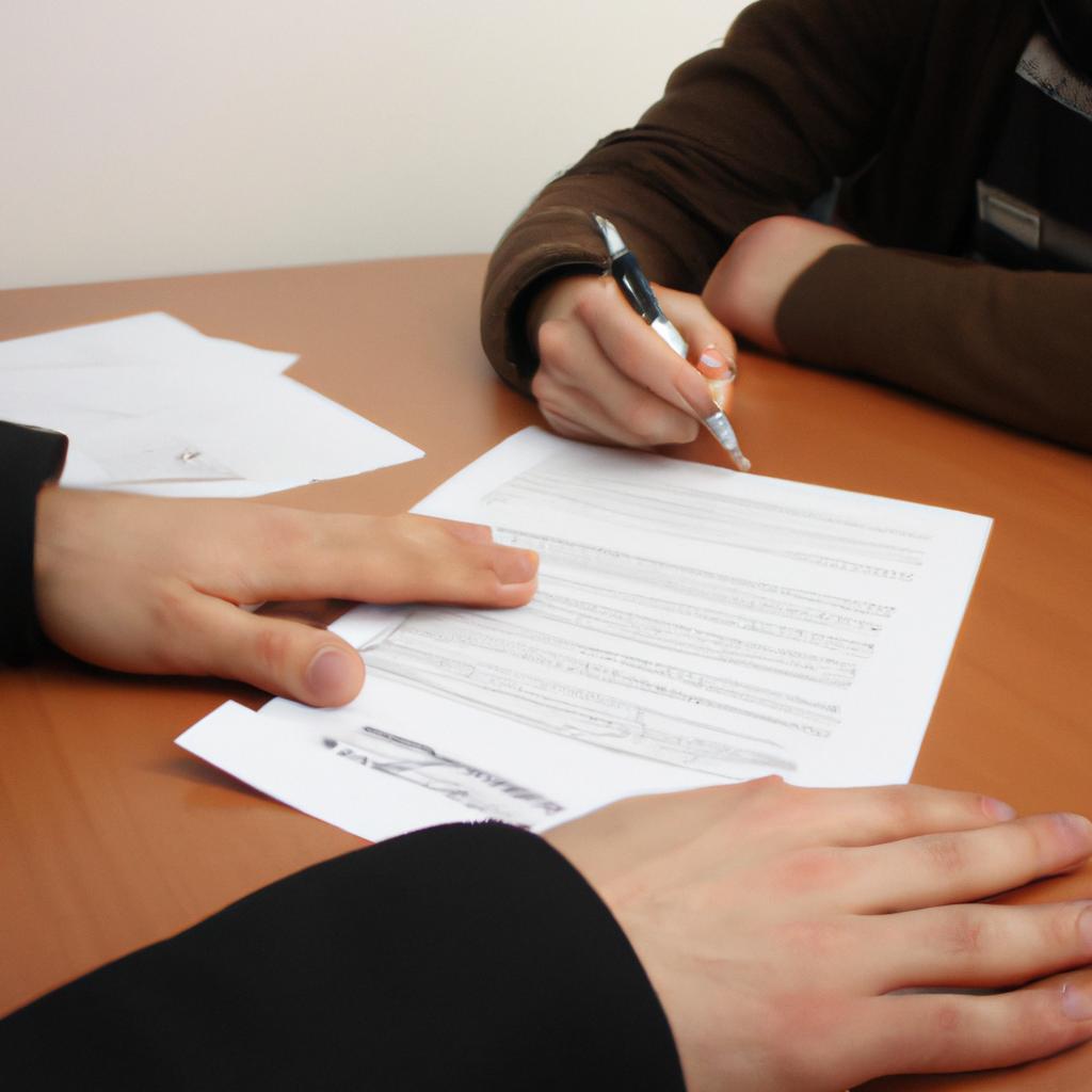 Person signing loan documents nervously